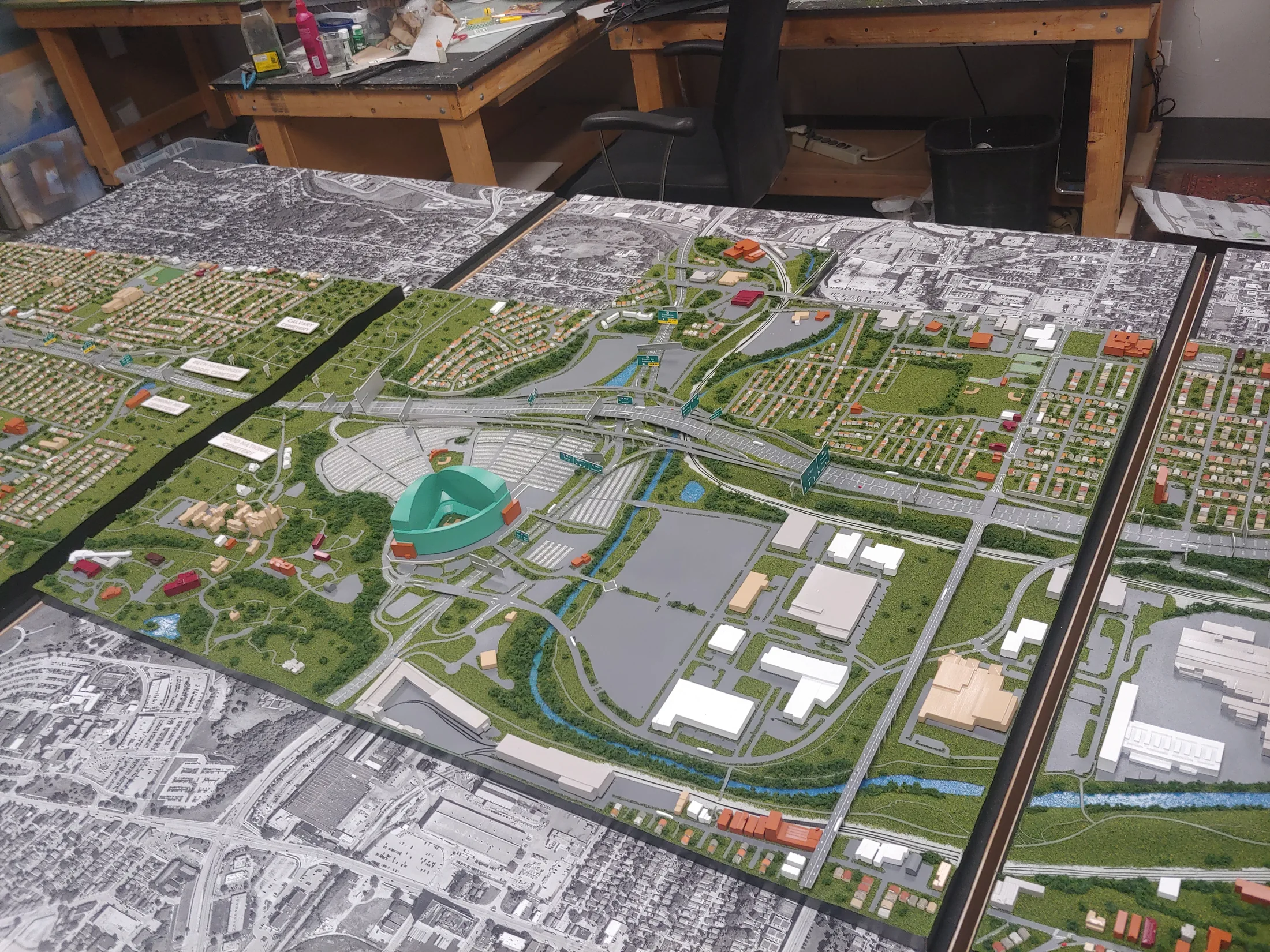 The completed WisDOT I-94 model in the Archetype3D workshop, with the original teal stadium, highway interchange and surrounding neighborhoods.